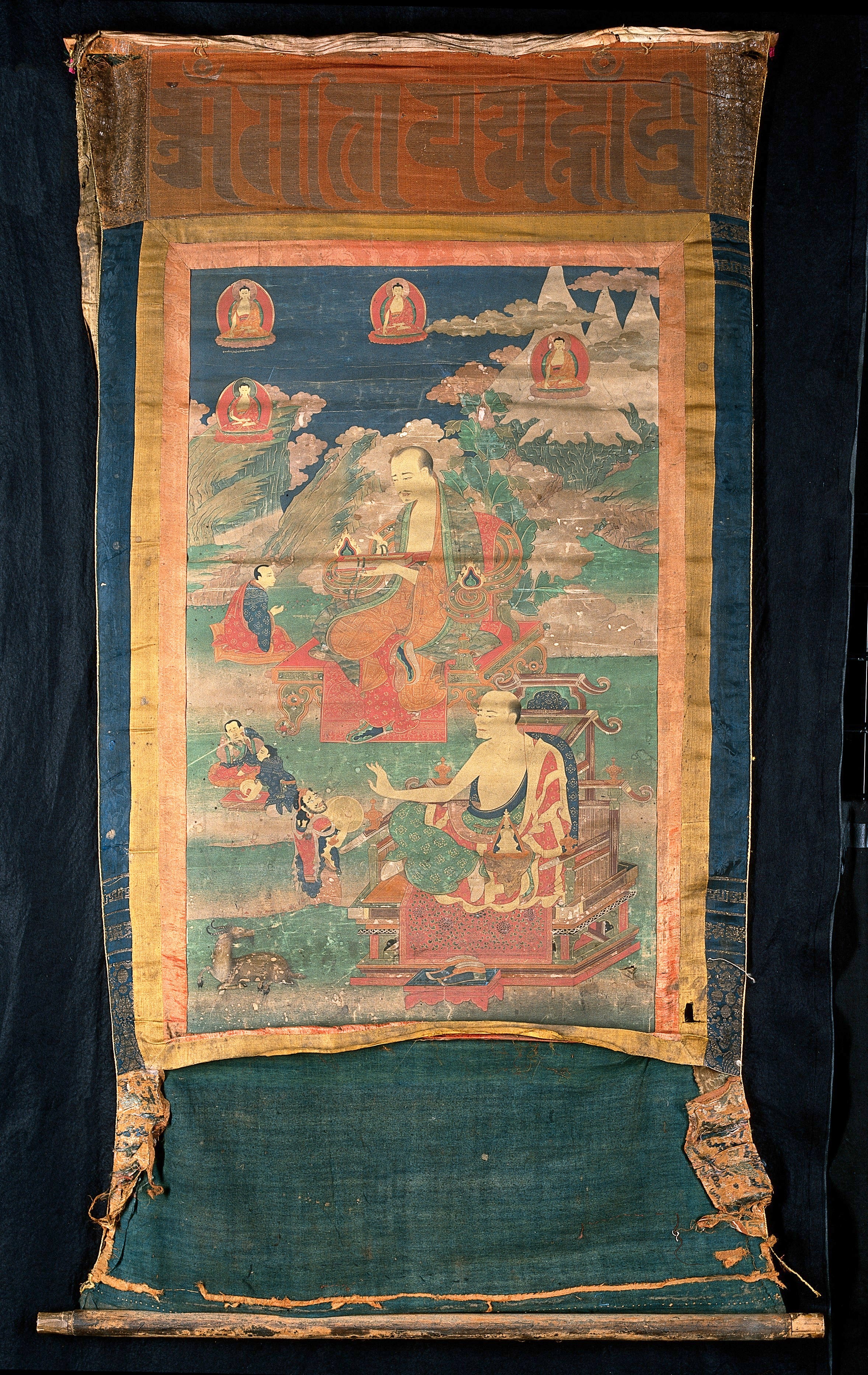 (Above) sBed-byed (Gopaka), holding a book;