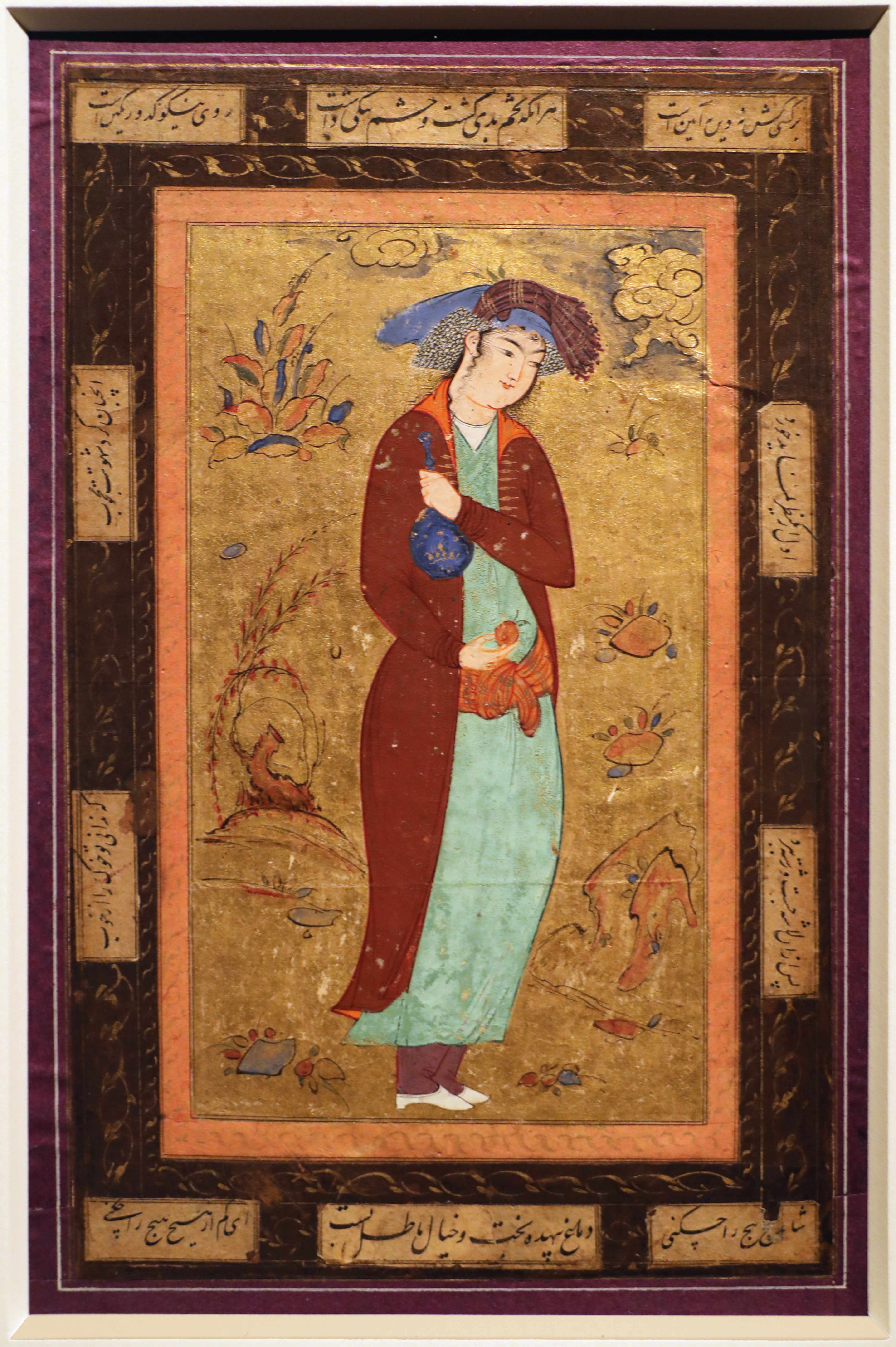 Iran, giovane in piedi con bottiglia e albicocca, isfahan 1600-33 ca